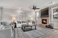 Stock Model Photo. Enjoy a movie night in this cozy Living Room!