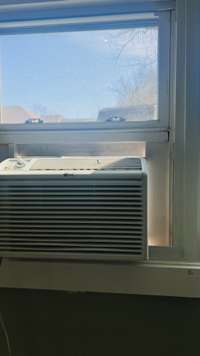 Additional window unit installed in the bedroom on the rear of the house