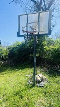 According to the plat map the basketball goal is located on this parcel BUT the owner is not making any claims for it and not certain of the safety of the structure.