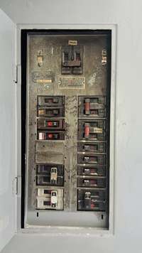 Breaker Panel in the kitchen - if renovating the enclosed utility room would be a great location to move the panel