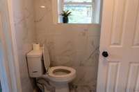 Natural Gas Heat in Full Bath, New Tub/Shower Combo and Wall Surround, New Toilet and Sink with Cabinet
