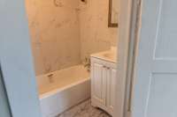 Natural Gas Heat in Full Bath, New Tub/Shower Combo and Wall Surround, New Toilet and Sink with Cabinet