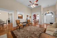 View to the open dining room and foyer