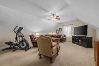Large bonus area over the garage has vaulted ceilings and plenty of room for whatever you envision for this space!