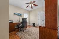 Third bedroom on main level is currently being used as an office. All flooring on main level is either hardwood or tile.