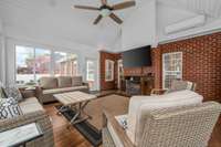 One of the stand-out features of this home is the expansive sunroom with vaulted paneled ceiling that is heated and cooled, making it a 4 season room.