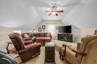 Large bonus area over the garage has vaulted ceilings and plenty of room for whatever you envision for this space!