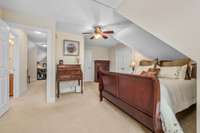 Upstairs bedroom is extra large. Perfect for guests to have a private suite to themselves. There is also walk-in attic access.