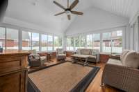 One of the stand-out features of this home is the expansive sunroom with vaulted paneled ceiling that is heated and cooled, making it a 4 season room.