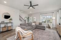Large Living Area Extends to Upper Balcony