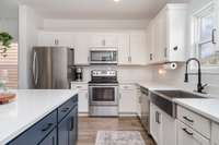 Kitchen with Farmhouse Sink, Tons of Island Storage - Plus a Pantry