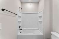 Private Bath in Guest Room 3. Photo is of actual Home.