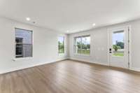 Living Room. Photo is of actual Home.