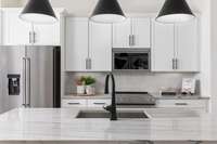 Kitchen - Photos are of a similar floorplan and for representational purposes only