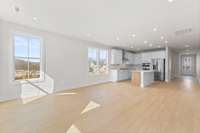 Great room *Photos are for representational purposes only and are of a similar floor plan with differing finishes*