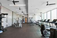 Gym with floor to ceiling windows