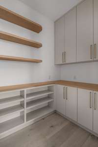 Generously sized pantry with tons of storage off of kitchen area