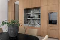 Wet bar with marble backsplash