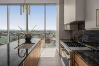 Lavish countertops with solid slab backsplash