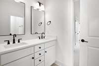 shared bathroom for bedrooms #3 and #4; double vanities