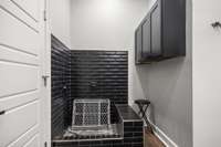 Furbaby bathing area within the laundry room