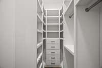 one of two walk-in closets in main suite