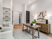 Office located near the primary suite with built-in Miele Coffee maker.