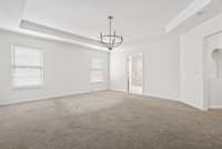 This bedroom is huge. Offers it's own sitting area and entry hallway.