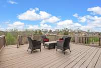 Top level deck off kitchen. Bring the grill!