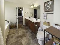 Primary Bath with Garden Tub, double vanities and separate shower