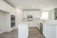 Enhanced Kitchen w/double ovens in all plans