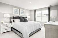 Generous owner’s bedroom with nice natural lighting. Features a full en-suite bathroom and a walk-in closet. Owner’s bedroom dimensions : 11’6” x 15’0”