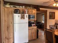 Custom Cabinets with a Pantry and Built In Spot with a Microwave