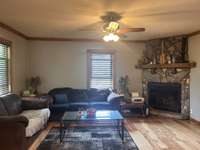 Living Room with Custom Stone Fireplace with Natural Gas Insert