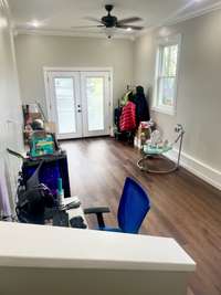 Recreational room, den, or multipurpose room.