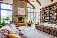The great room will take your breath away. Floor-to-ceiling windows to the magnificent stone fireplace reaching up to the vaulted ceiling and exposed wooden beams, you will believe you’re walking into the finest resort in the mountains.