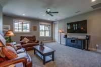 Two separate Bedroom ensuites with private bathrooms and walk-in closets are located on opposite sides of the Den/Media. Also, a large hallway features a study area/office.