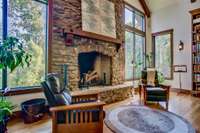 Light the fire and linger a little longer beside this massive stone fireplace.