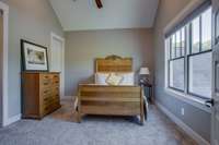 The third and fourth bedrooms with cathedral ceilings and private bathrooms.. Organization shelving in large walk-in closets. Surprise hidden rooms behind the large mirrored door in the walk-in closet.
