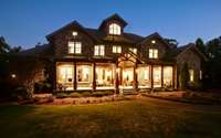 A Lodge retreat blends luxury, functionality, and sustainability. Powered by Solar panels with Tesla Powerwalls in the garage.