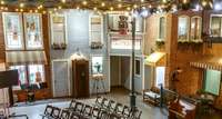 The Audio-Visual Control booth, located top center of the photo, controls all the lighting, audio, and video for both the main room and cinema.  Stage your collections, trophies, and awards in the glass display cases throughout your own Main Street.