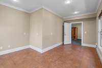 This space was used as an office, but could be anything! There is a door with access to the backyard.