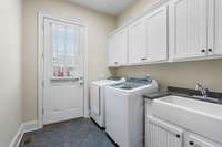 The laundry room/drop zone off the kitchen.