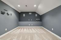 MEDIA ROOM!  Grab the popcorn. Retreat upstairs and close the door behind you.
