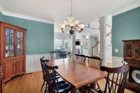 The dining room os open to the foyer and living room.