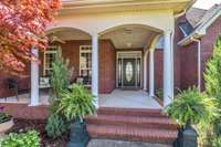 The covered front porch is a great place to relax or visit.