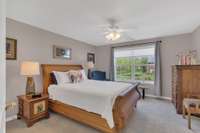 This bedroom is ensuite! tub/shower and tile floors.