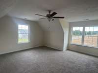 Photo of different home but same floor plan. Finishes will vary.