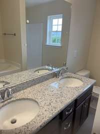 Photo of different home but same floor plan. Finishes will vary.
