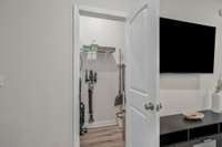 This is a large utility closet which continues around to the right, providing some great extra storage for this townhome.